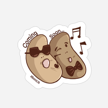 Cartoon-style potato characters with musical notes and 'Coming Soon' text on a white background.
