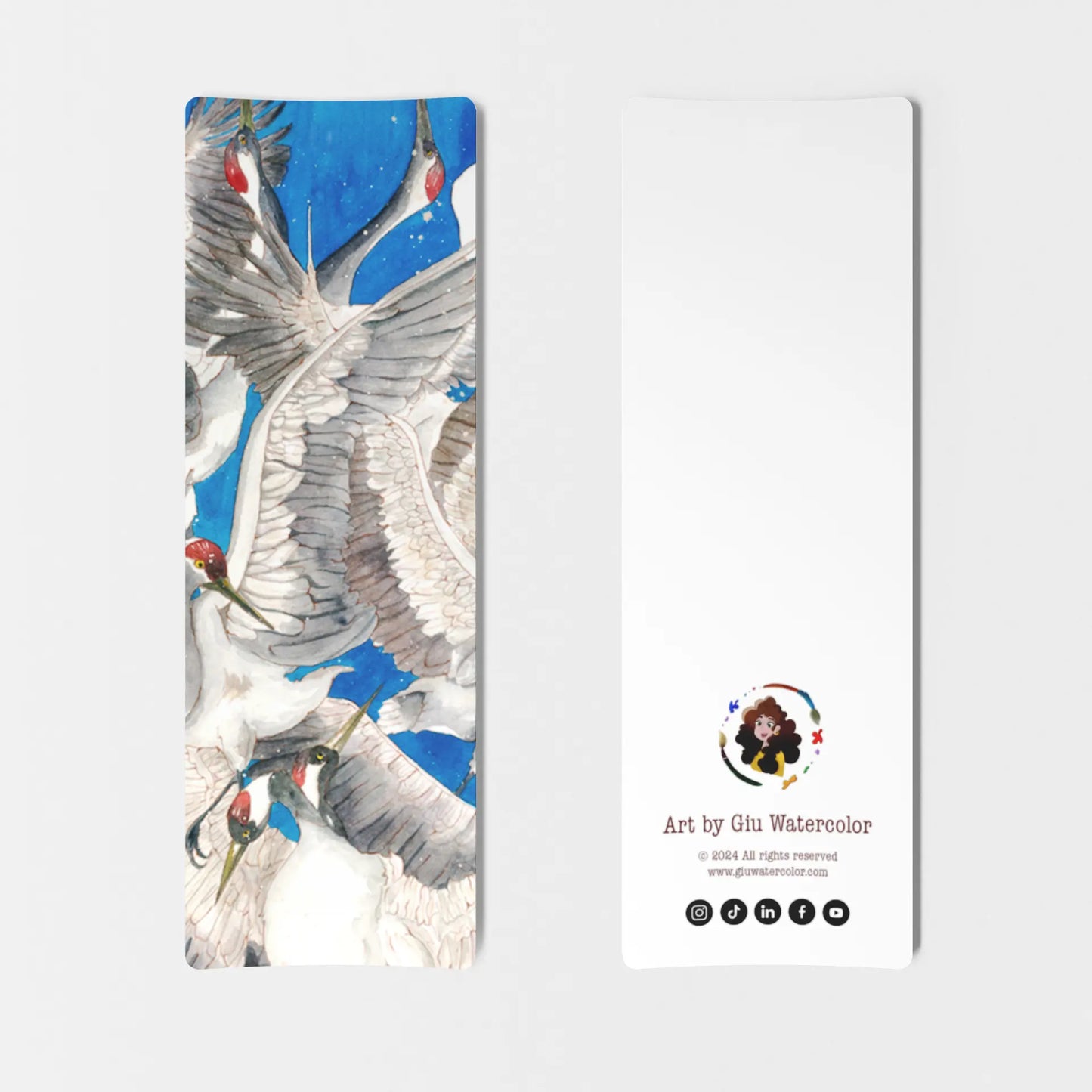 Watercolor bookmark featuring a dynamic scene of flying cranes against a deep blue sky — elegant wildlife art by Giulia Giampaolo.