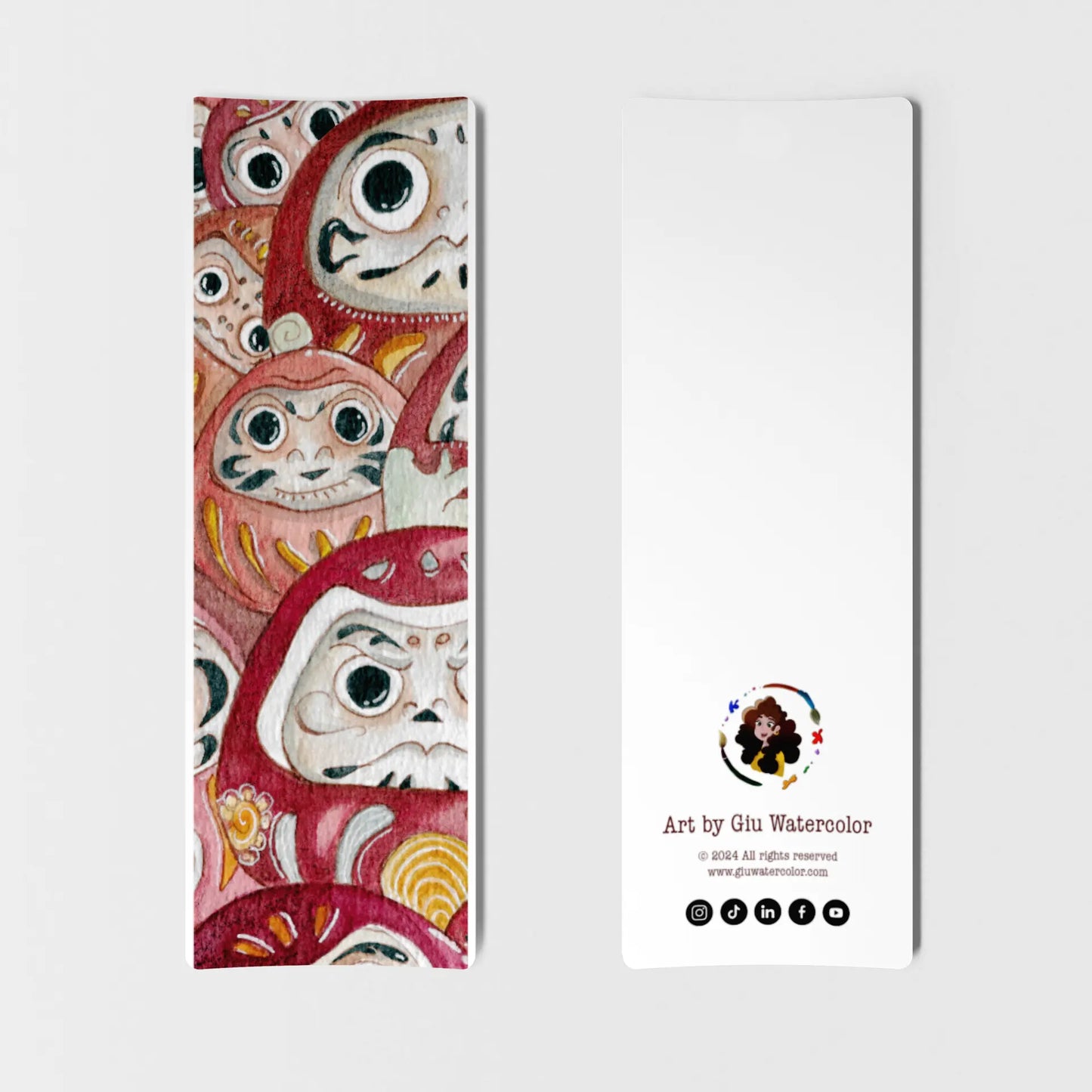 Watercolor bookmark inspired by Japanese daruma dolls — symbolic illustration of luck and perseverance by Giulia Giampaolo.