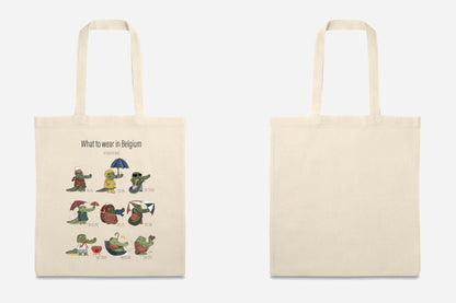 Flat lay of the What to Wear in Belgium tote bag showing crocodiles in different outfits, created by Giulia Giampaolo.